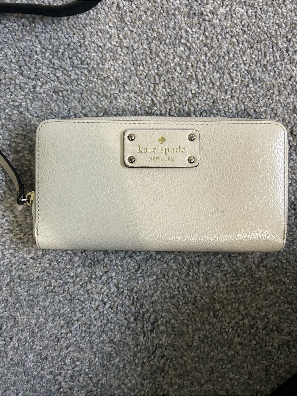 kate spade cream pebbled leather zip-around wallet with gold logo